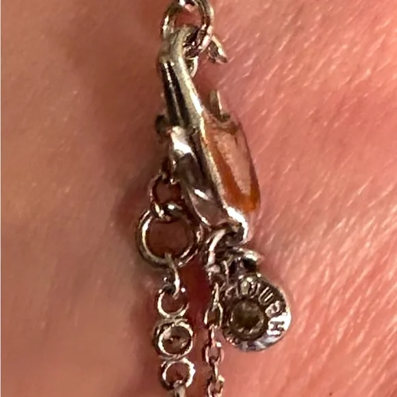 Gorgeous HENRI BENDEL Sparkly Rhinestone, Silver Infinity Bracelet - Picture 4 of 11